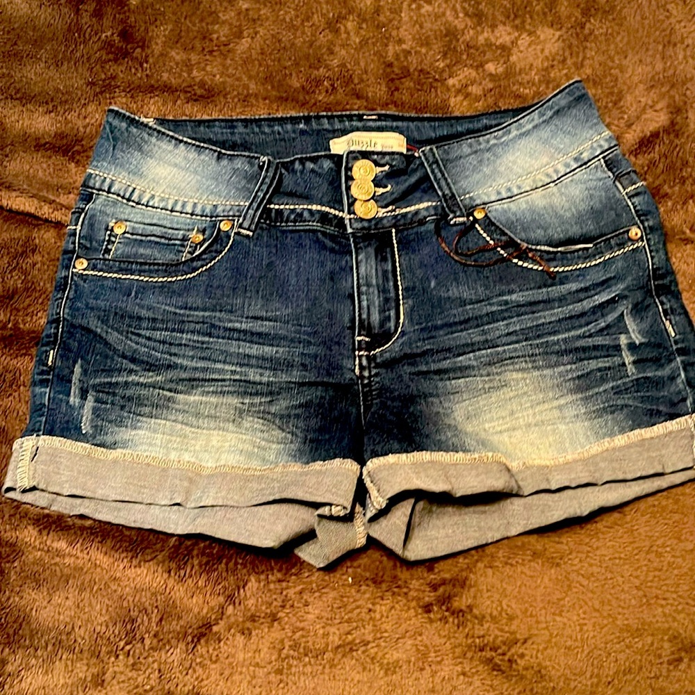 NNT Puzzle distress/dk/high thigh jean shorts Sz 9/10 button pockets